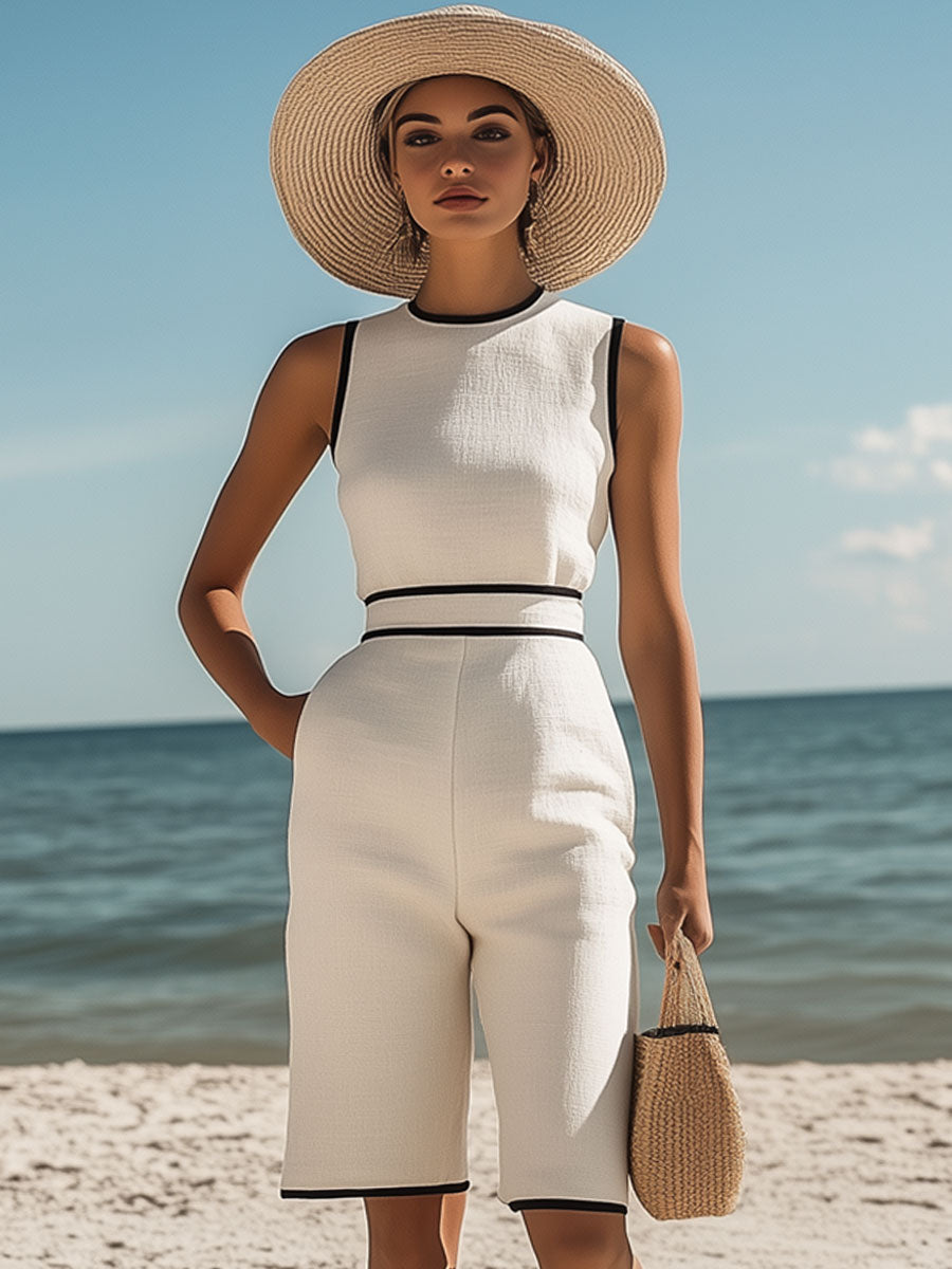 Annt™ Stilren Vit Jumpsuit – Unika Svarta Detaljer för Perfekt Sommaroutfit!