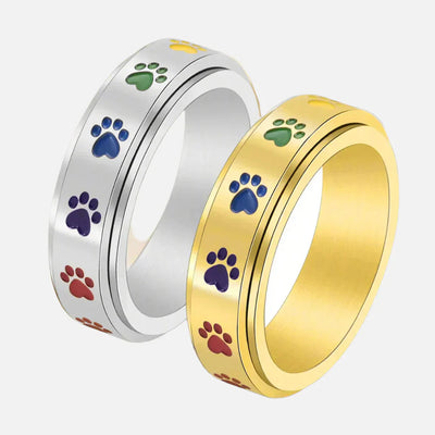 Rotativ Antistressring i Guld och Silver med Färgade Tassmönster – Thea