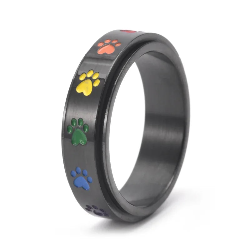 Rotativ Antistressring i Guld och Silver med Färgade Tassmönster – Thea