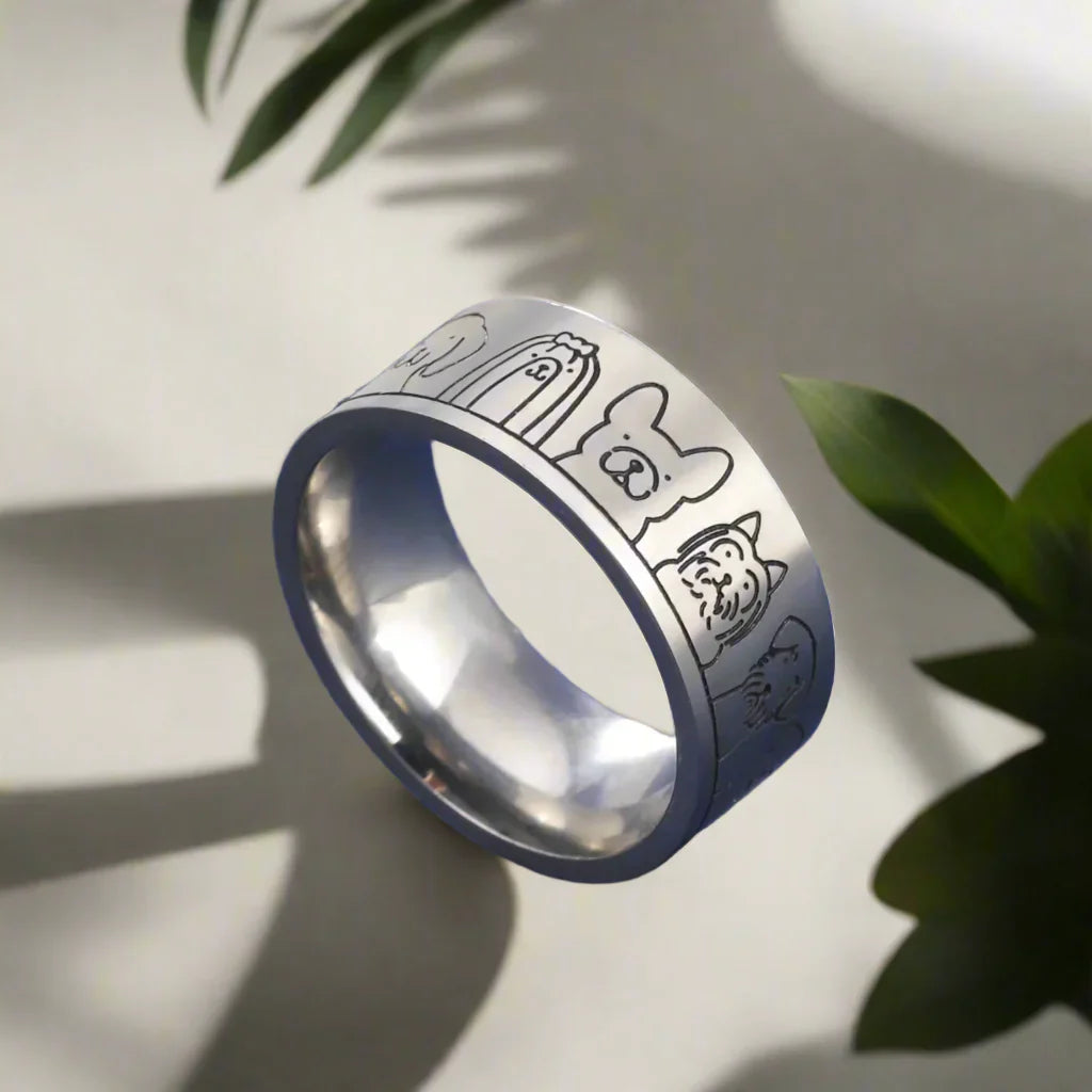 Ring i Guld och Silver med Graverade Fötter – Nika