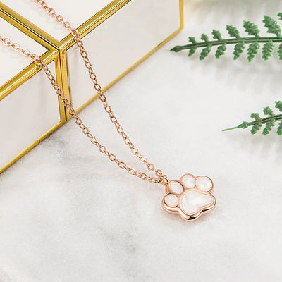 Malia - Halsband med tasshängsmycke i silver