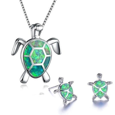 NAIAE - Halsband och örhängen med havssköldpadda i silver och opal
