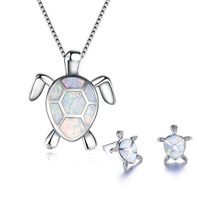 NAIAE - Halsband och örhängen med havssköldpadda i silver och opal